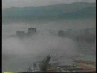 Genova avvolta dalla nebbia