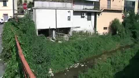 IL RIO TORBELLA RICOPERTO DA ORTI E STERPAGLIE