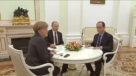 Vertice Putin, Merkel e Hollande: le immagini 